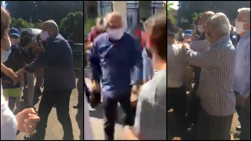 Alpidio Alonso (con camisa azul oscuro), se acercó al grupo y agredió físicamente al periodista independiente Mauricio Mendoza. (collage)