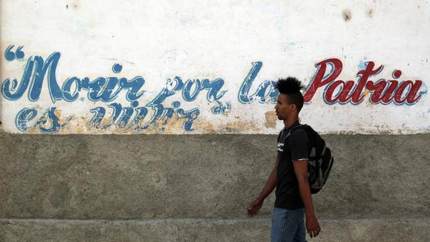 joven cubano, consigna, morir por la patria 