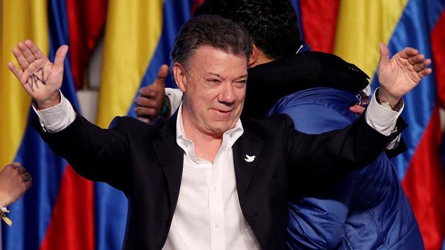 Juan Manuel Santos celebra su reelecciÃ³n la noche electoral. (Leonardo MuÃ±oz. EFE) 
